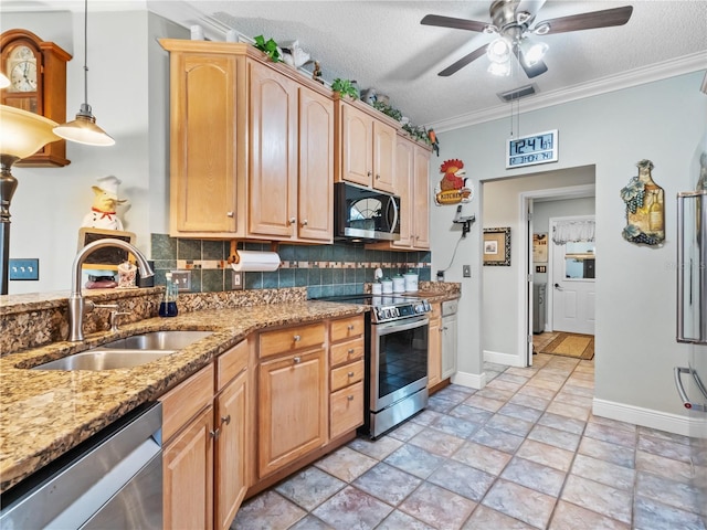 kitchen featuring stainless steel appliances, a sink, visible vents, ornamental molding, and backsplash