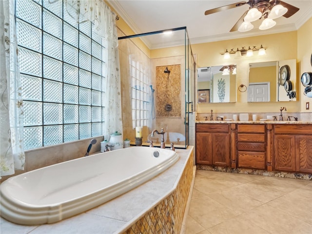 full bathroom with double vanity, ornamental molding, a stall shower, and a bath