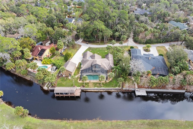 bird's eye view with a water view