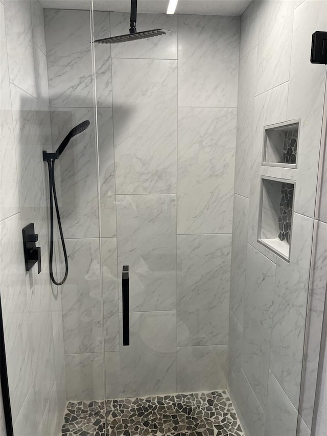 full bathroom with a stall shower