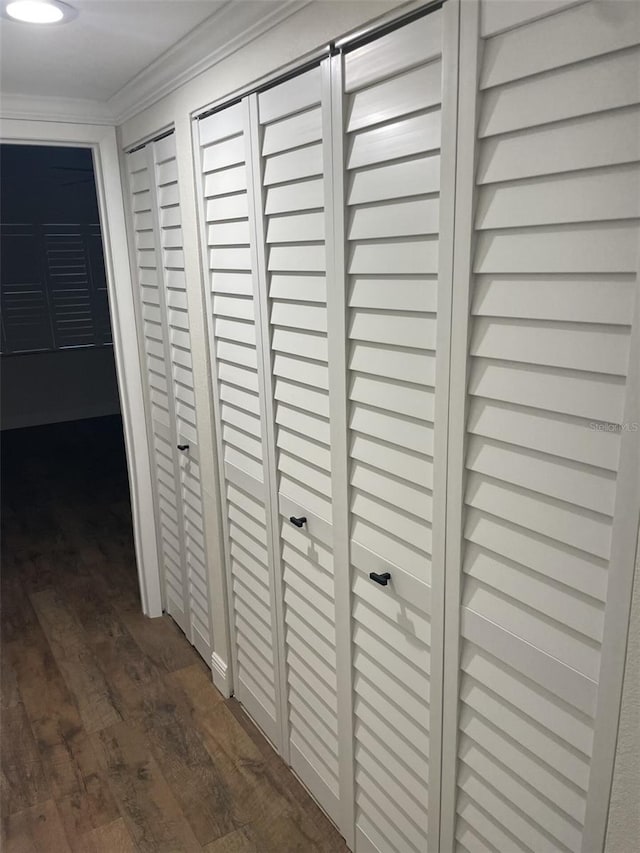 room details with crown molding and wood finished floors