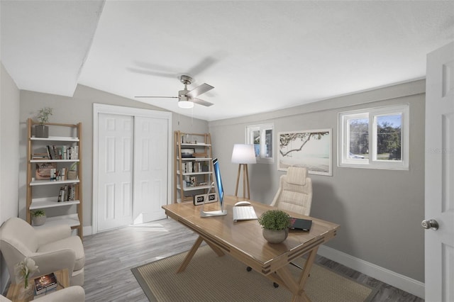 1203 S Pomegranite Ave, Sanford, FL 32771 - office area featuring vaulted ceiling, wood finished floors, baseboards, and ceiling fan