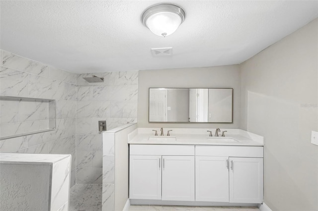 1203 S Pomegranite Ave, Sanford, FL 32771 - bathroom featuring walk in shower, a sink, visible vents, and double vanity