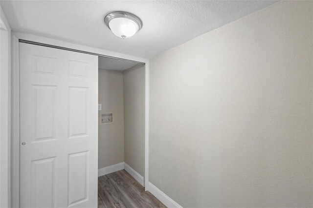 1203 S Pomegranite Ave, Sanford, FL 32771 - interior space featuring baseboards and dark wood-style flooring