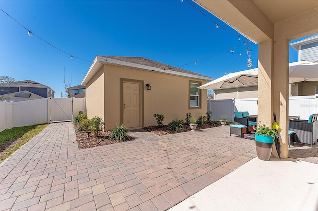 view of patio featuring a gate and a fenced backyard