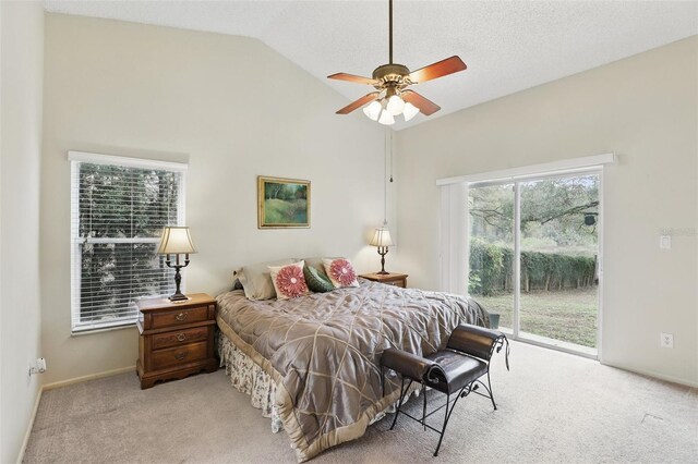 bedroom with baseboards, light colored carpet, access to exterior, vaulted ceiling, and a textured ceiling