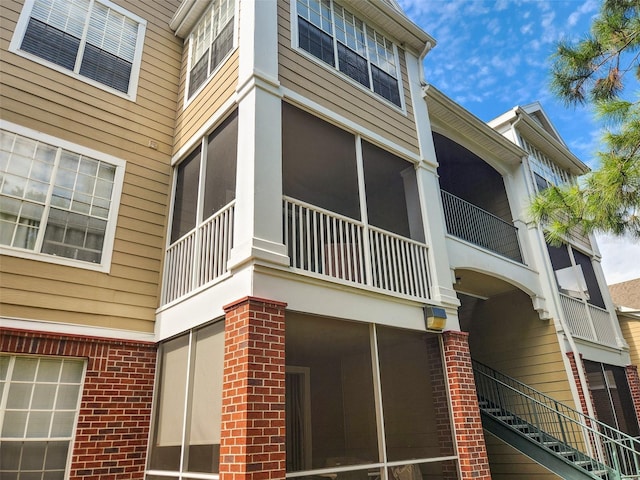 view of property featuring stairs