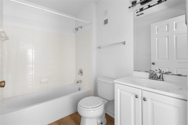 13037 Mulberry Park Dr Unit 529, Orlando, FL 32821 - full bath with tub / shower combination, vanity, and wood finished floors