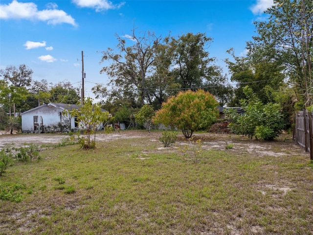 view of yard featuring fence