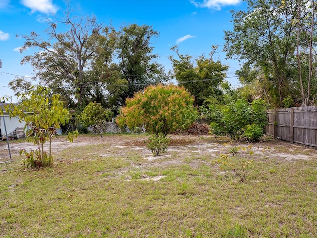 view of yard featuring fence