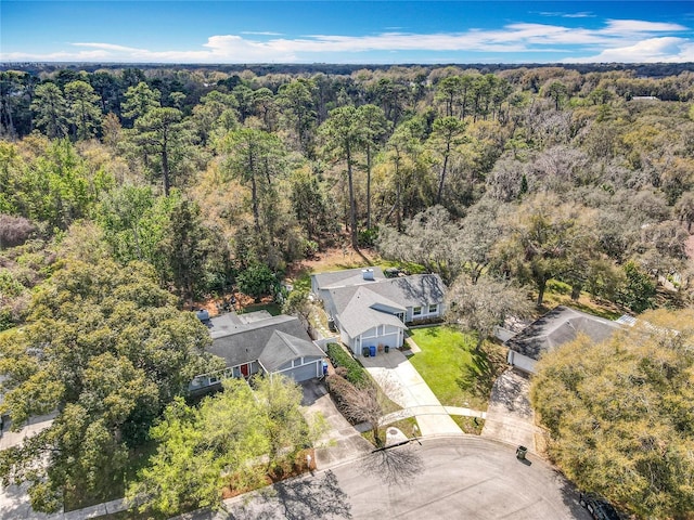 bird's eye view featuring a view of trees