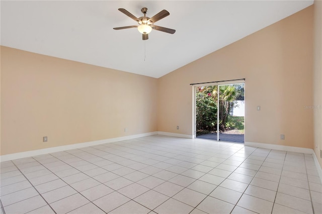 spare room with high vaulted ceiling, light tile patterned flooring, a ceiling fan, and baseboards