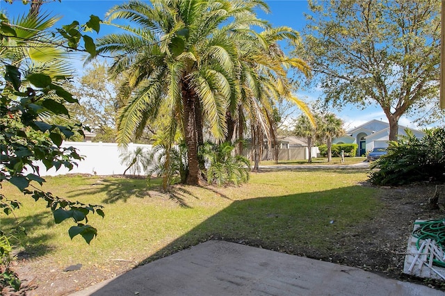 view of yard featuring fence