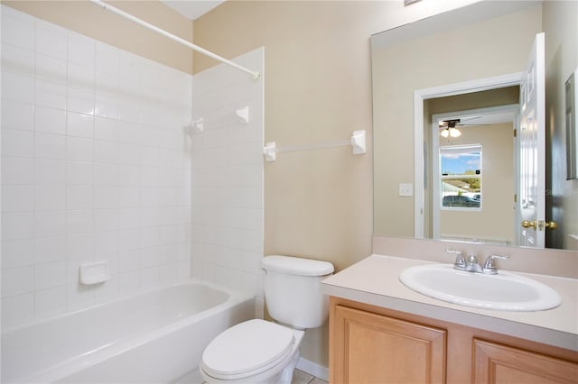 bathroom with toilet, tub / shower combination, and vanity