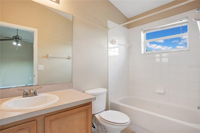 bathroom featuring toilet, ceiling fan, tub / shower combination, and vanity