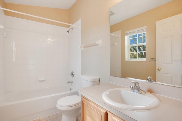 bathroom with shower / bath combination, vanity, and toilet