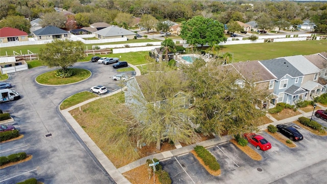 birds eye view of property with a residential view