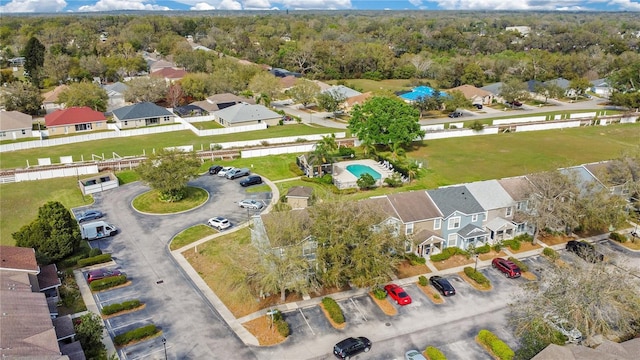 birds eye view of property with a residential view