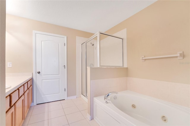 bathroom featuring a jetted tub, tile patterned flooring, vanity, and a shower stall