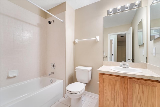 bathroom with toilet, tile patterned flooring, vanity, and shower / bathtub combination