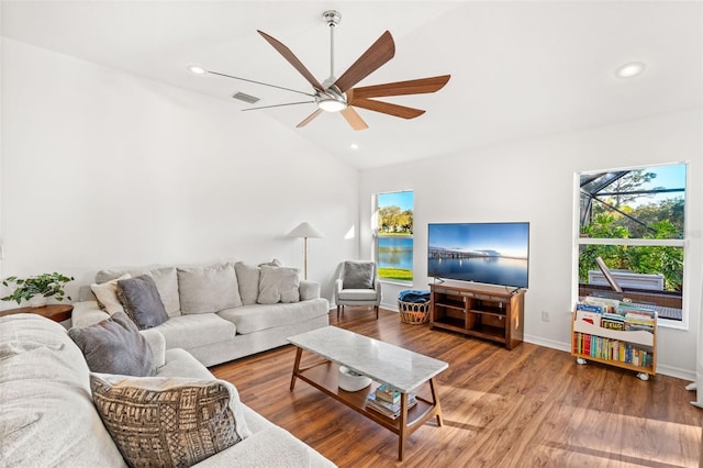 living area featuring visible vents, ceiling fan, wood finished floors, vaulted ceiling, and recessed lighting