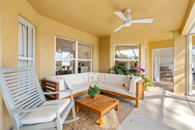 exterior space with a ceiling fan and an outdoor living space