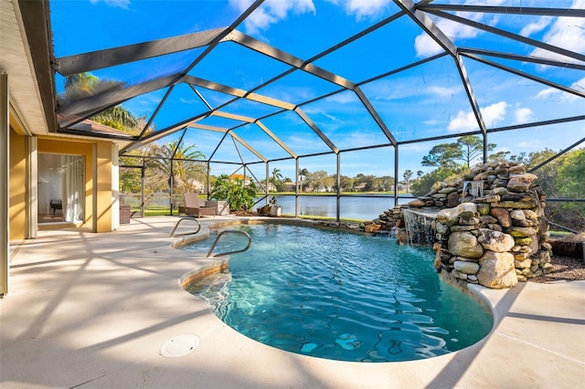 pool with a lanai, a water view, and a patio