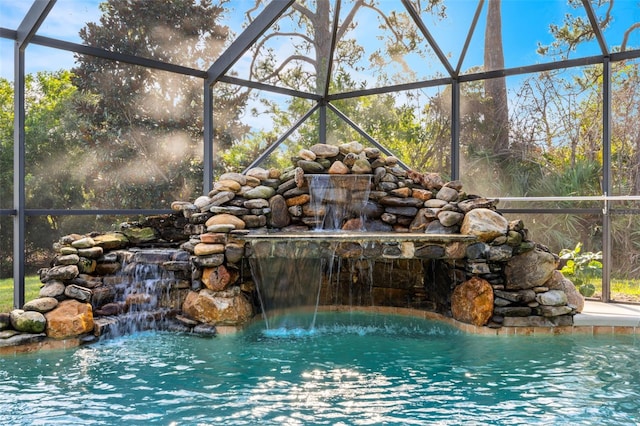 outdoor pool with glass enclosure