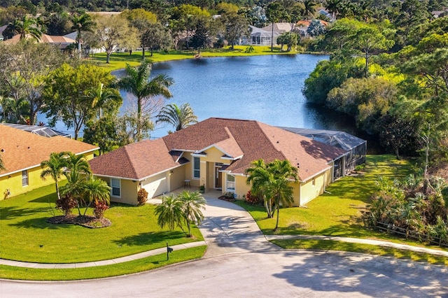 drone / aerial view featuring a water view