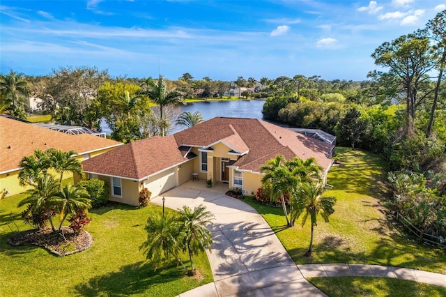 drone / aerial view with a water view