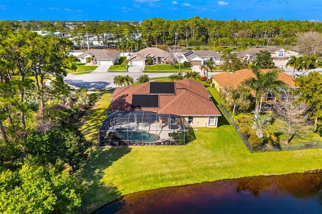 bird's eye view with a water view and a residential view