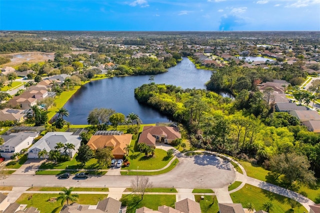 bird's eye view featuring a water view and a residential view