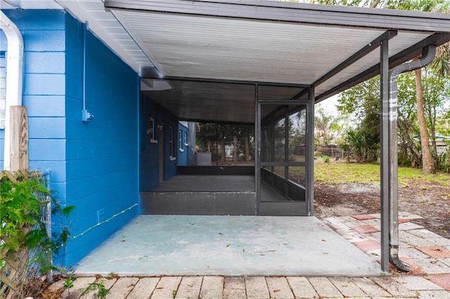 exterior space with a carport