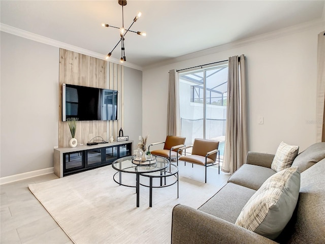 living area featuring ornamental molding, a notable chandelier, and baseboards