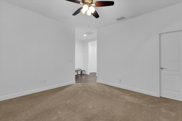 unfurnished room featuring visible vents, baseboards, ceiling fan, carpet, and recessed lighting