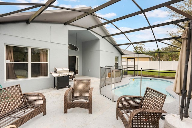 view of pool featuring a fenced in pool, a patio, glass enclosure, a grill, and fence