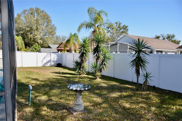 view of yard featuring a fenced backyard