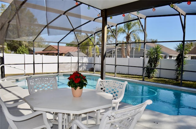 view of pool with a fenced in pool, a patio area, a lanai, and a fenced backyard