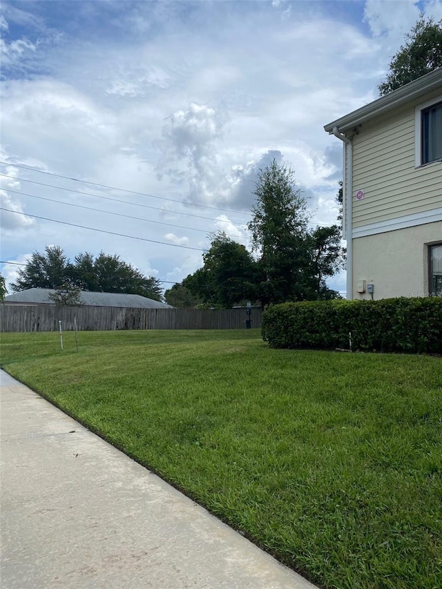 view of yard with fence