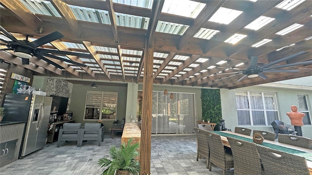 view of patio / terrace featuring ceiling fan, outdoor dining space, an outdoor living space, and a pergola