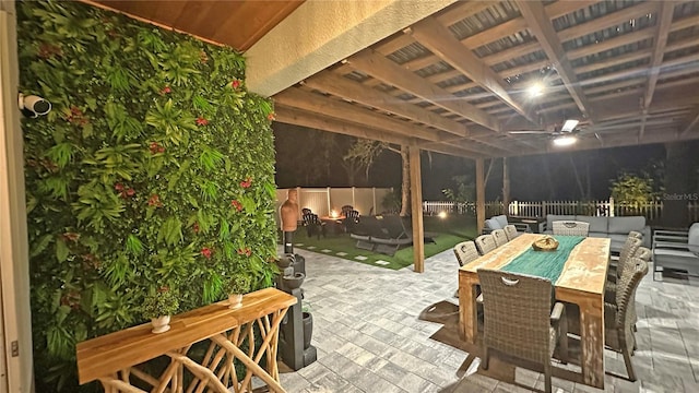 view of patio featuring outdoor dining area, outdoor lounge area, and a fenced backyard