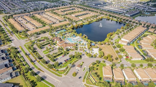 bird's eye view featuring a residential view and a water view