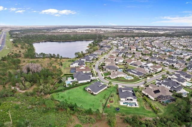 aerial view with a water view and a residential view