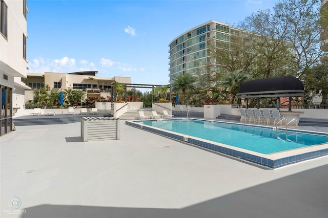 community pool with a patio