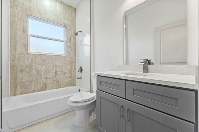 bathroom featuring washtub / shower combination, vanity, toilet, and tile patterned floors