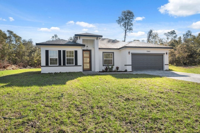 view of front of home featuring a garage, stucco siding, decorative driveway, and a front yard