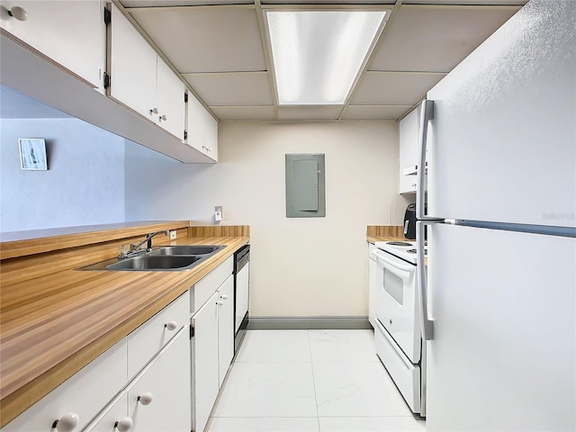 kitchen featuring light countertops, electric panel, white cabinets, marble finish floor, and white appliances