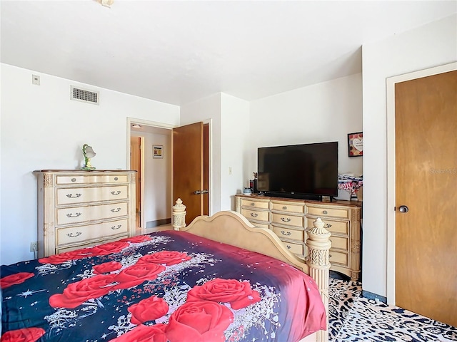 bedroom featuring visible vents