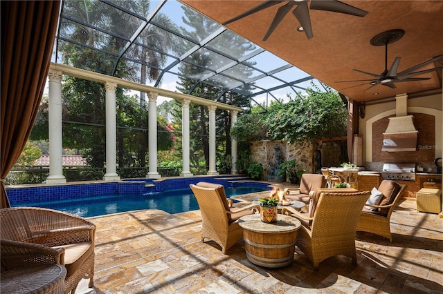 view of patio featuring area for grilling, glass enclosure, a pool with connected hot tub, and ceiling fan