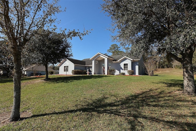 single story home with a front yard